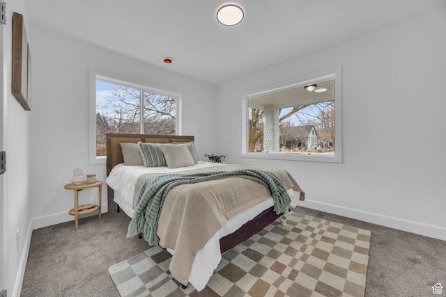 590 E 7th St, Ogden, UT 84404 - carpeted bedroom featuring baseboards