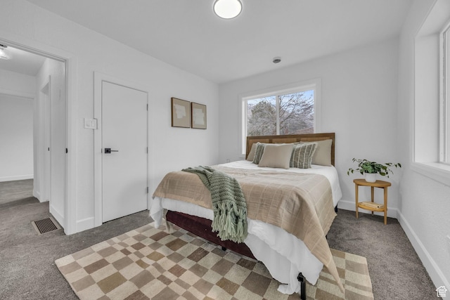 590 E 7th St, Ogden, UT 84404 - carpeted bedroom featuring visible vents and baseboards