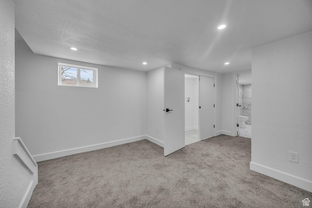 590 E 7th St, Ogden, UT 84404 - below grade area featuring baseboards, recessed lighting, a textured ceiling, carpet flooring, and a textured wall
