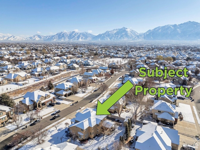 bird's eye view featuring a mountain view and a residential view