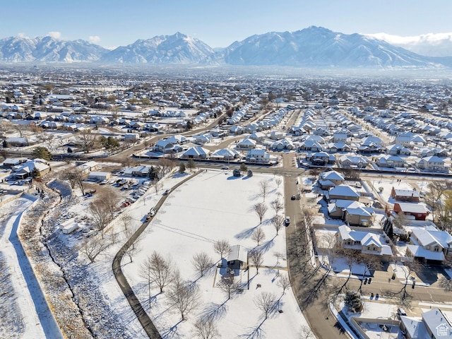 drone / aerial view featuring a residential view and a mountain view
