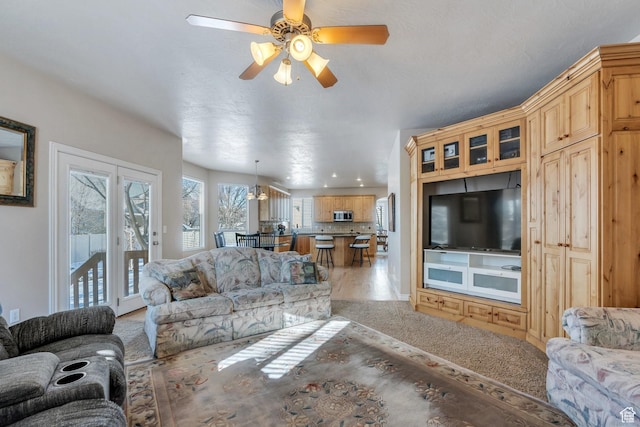 living room featuring ceiling fan