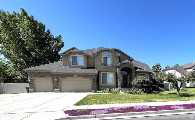 2943 W Current Creek Dr, South Jordan, UT 84095 - view of front of property featuring stucco siding, driveway, and stone siding