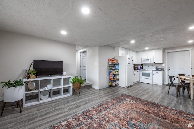 3061 W 13800 S, Bluffdale, UT 84065 - living room featuring recessed lighting, baseboards, a textured ceiling, and dark wood-style floors