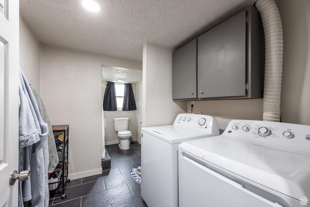 3061 W 13800 S, Bluffdale, UT 84065 - laundry room featuring cabinet space, a textured ceiling, baseboards, and separate washer and dryer
