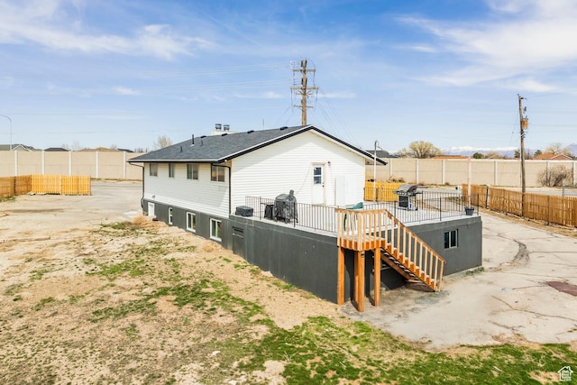 3061 W 13800 S, Bluffdale, UT 84065 - rear view of house with a shingled roof, a wooden deck, stairs, and fence
