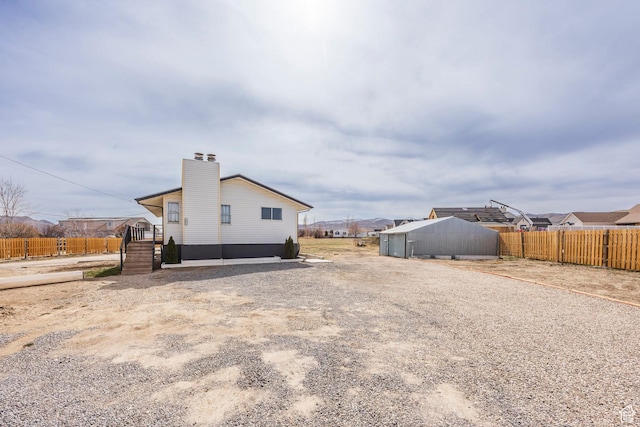 3061 W 13800 S, Bluffdale, UT 84065 - exterior space with a chimney and fence