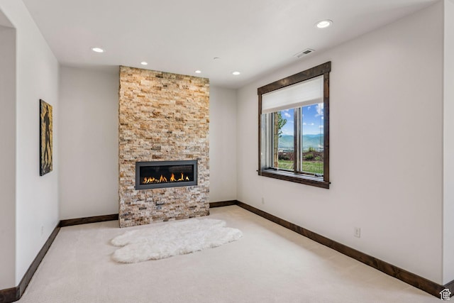 1075 N Oquirrh Mountain Dr Unit 64, Heber City, UT 84032 - unfurnished living room featuring carpet flooring, recessed lighting, and a fireplace