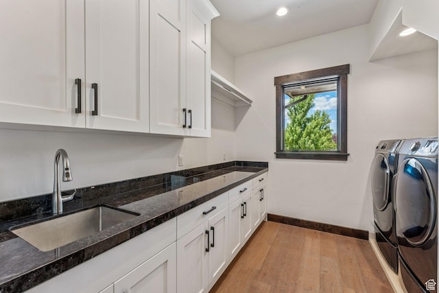 1075 N Oquirrh Mountain Dr Unit 64, Heber City, UT 84032 - washroom with washer and clothes dryer, cabinet space, light wood-type flooring, and recessed lighting