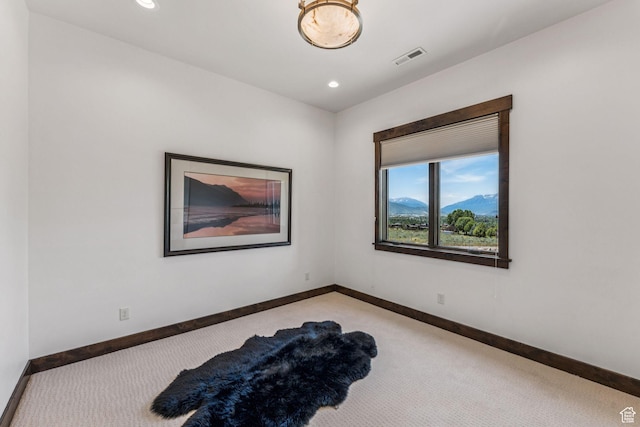 1075 N Oquirrh Mountain Dr Unit 64, Heber City, UT 84032 - spare room with light colored carpet and recessed lighting
