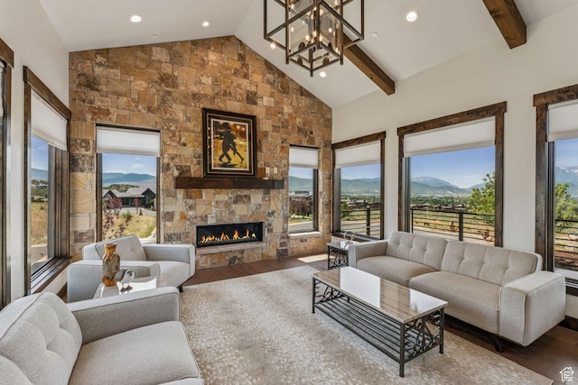 1075 N Oquirrh Mountain Dr Unit 64, Heber City, UT 84032 - living room featuring a stone fireplace, wood finished floors, a chandelier, beamed ceiling, and recessed lighting