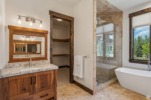 1075 N Oquirrh Mountain Dr Unit 64, Heber City, UT 84032 - full bath featuring a stall shower, a soaking tub, and vanity