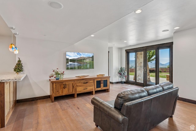 1075 N Oquirrh Mountain Dr Unit 64, Heber City, UT 84032 - living room featuring light wood-style floors and recessed lighting