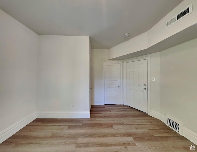 672 N 200 W, Salt Lake City, UT 84103 - spare room with baseboards, visible vents, and light wood-type flooring