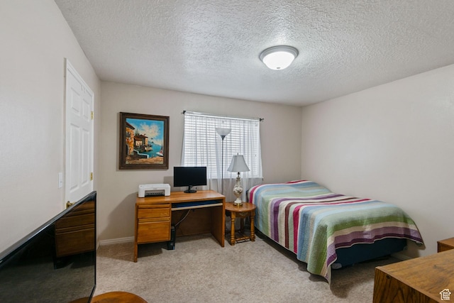 8246 N Cedar Springs Rd Unit 1, Eagle Mountain, UT 84005 - bedroom with baseboards, light carpet, and a textured ceiling