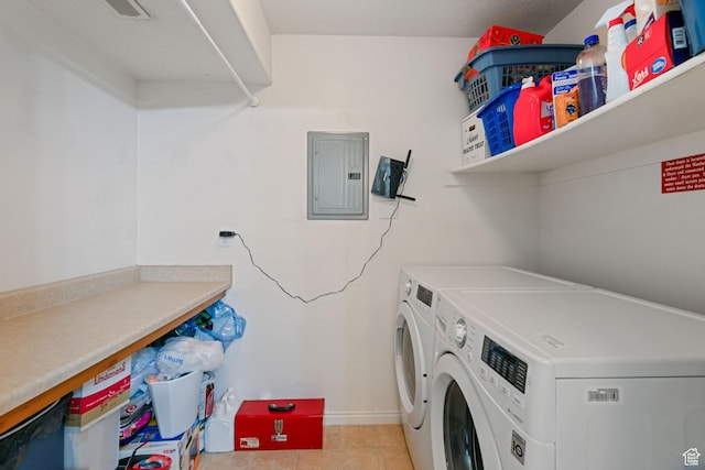 8246 N Cedar Springs Rd Unit 1, Eagle Mountain, UT 84005 - clothes washing area featuring baseboards, electric panel, laundry area, light tile patterned flooring, and washer and dryer