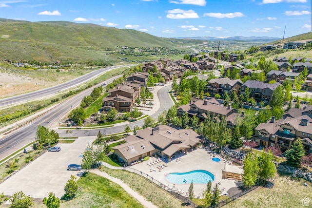 birds eye view of property with a residential view and a mountain view