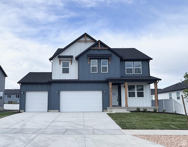 modern farmhouse style home with board and batten siding, concrete driveway, and a shingled roof