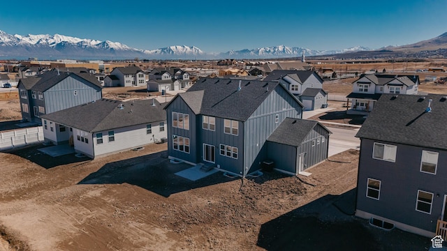 aerial perspective of suburban area with mountains