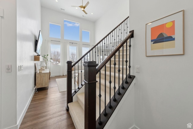 541 N 1400 E, Heber City, UT 84032 - staircase with wood finished floors, baseboards, recessed lighting, ceiling fan, and a towering ceiling