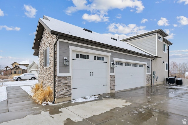 541 N 1400 E, Heber City, UT 84032 - view of property exterior with concrete driveway, a garage, and stone siding