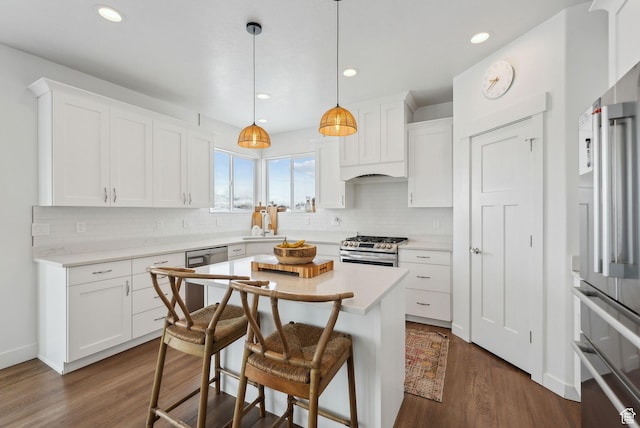 541 N 1400 E, Heber City, UT 84032 - kitchen with white cabinets, appliances with stainless steel finishes, and dark wood-style flooring