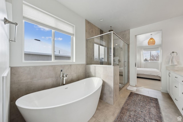 541 N 1400 E, Heber City, UT 84032 - full bathroom featuring tile patterned flooring, a shower stall, a freestanding bath, vanity, and ensuite bath
