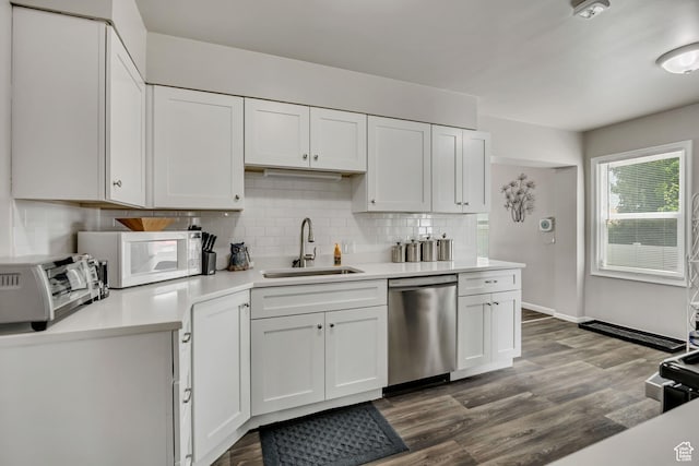 357 S 600 E, Clearfield, UT 84015 - kitchen with stainless steel dishwasher, white microwave, light countertops, tasteful backsplash, and white cabinets