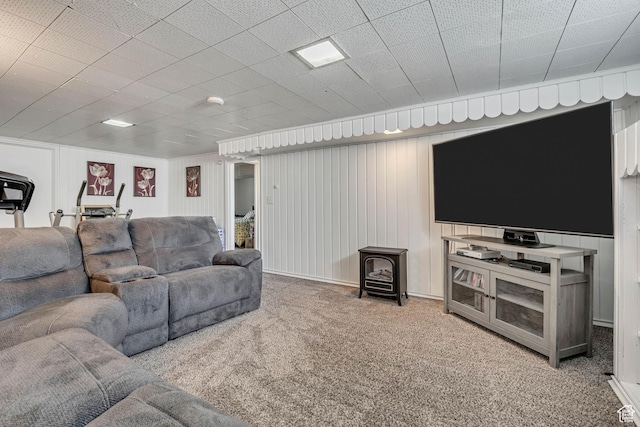 357 S 600 E, Clearfield, UT 84015 - living area with a wood stove and carpet flooring