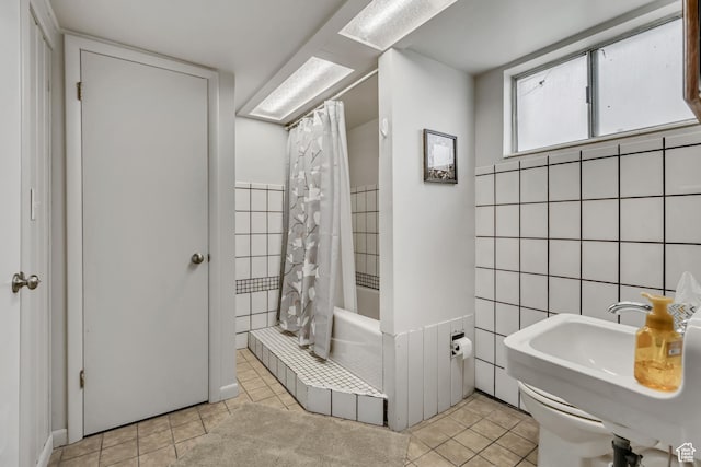 357 S 600 E, Clearfield, UT 84015 - full bathroom featuring tile walls, tiled shower, and tile patterned floors