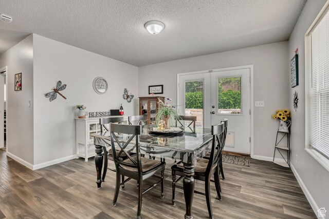 357 S 600 E, Clearfield, UT 84015 - dining space featuring wood finished floors, a textured ceiling, and french doors