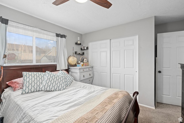 2670 S Melville Dr, Magna, UT 84044 - carpeted bedroom with ceiling fan, baseboards, a closet, and a textured ceiling