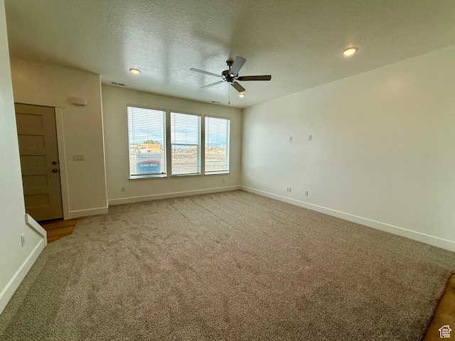 3362 S 1010 W, Nibley, UT 84321 - unfurnished room featuring light carpet, baseboards, and a ceiling fan