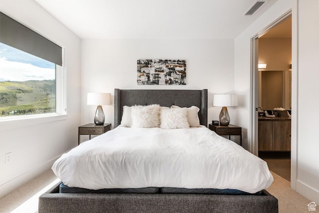 2752 W High Mountain Rd Unit 306, Park City, UT 84098 - carpeted bedroom featuring ensuite bath and visible vents