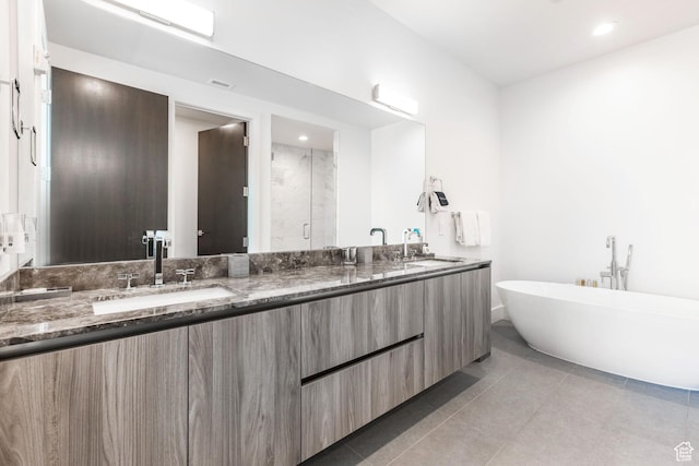 2752 W High Mountain Rd Unit 306, Park City, UT 84098 - bathroom with double vanity, a shower stall, tile patterned floors, and a sink