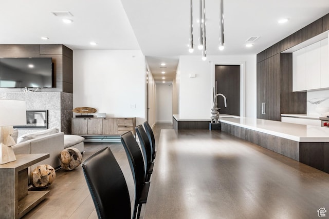 2752 W High Mountain Rd Unit 306, Park City, UT 84098 - kitchen featuring decorative light fixtures, visible vents, modern cabinets, and light countertops