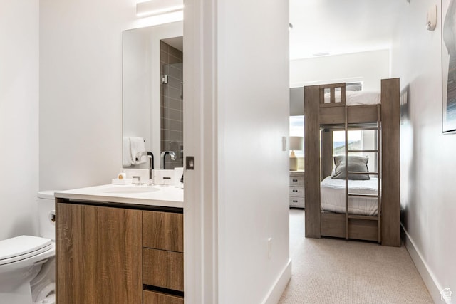 2752 W High Mountain Rd Unit 306, Park City, UT 84098 - bathroom featuring vanity, toilet, and baseboards