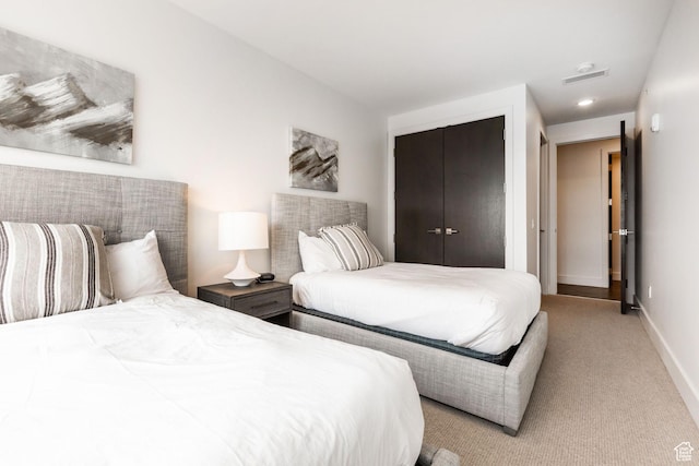 2752 W High Mountain Rd Unit 306, Park City, UT 84098 - bedroom with visible vents, baseboards, light colored carpet, recessed lighting, and a closet