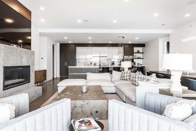 2752 W High Mountain Rd Unit 306, Park City, UT 84098 - living room with recessed lighting, dark wood-type flooring, and a fireplace