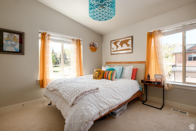 8077 Courtyard Loop Unit 11, Park City, UT 84098 - carpeted bedroom with multiple windows, lofted ceiling, and baseboards