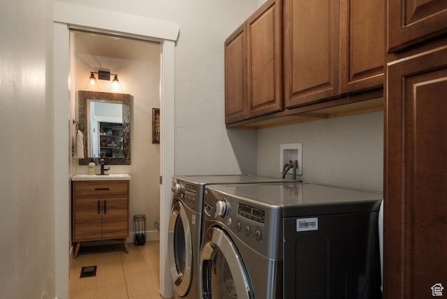 8077 Courtyard Loop Unit 11, Park City, UT 84098 - washroom featuring separate washer and dryer, cabinet space, and baseboards