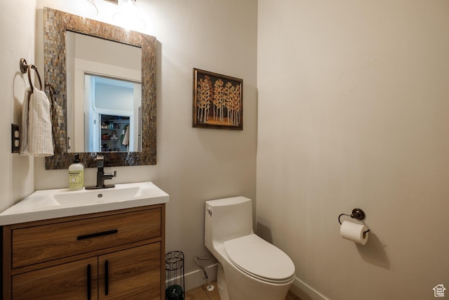 8077 Courtyard Loop Unit 11, Park City, UT 84098 - half bathroom with vanity, toilet, and baseboards