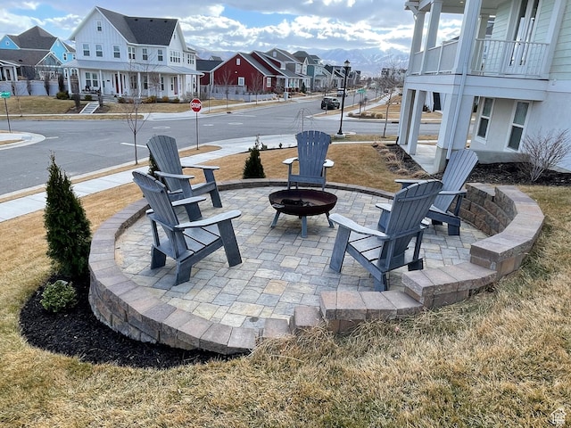 10887 S Lamond Dr, South Jordan, UT 84009 - view of patio with a residential view and an outdoor fire pit