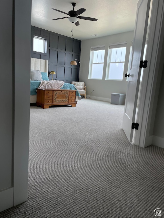 10887 S Lamond Dr, South Jordan, UT 84009 - bedroom featuring multiple windows, carpet, baseboards, and ceiling fan
