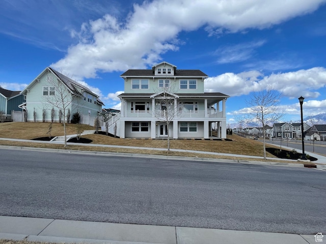 10887 S Lamond Dr, South Jordan, UT 84009 - view of front of home with a front yard and a balcony