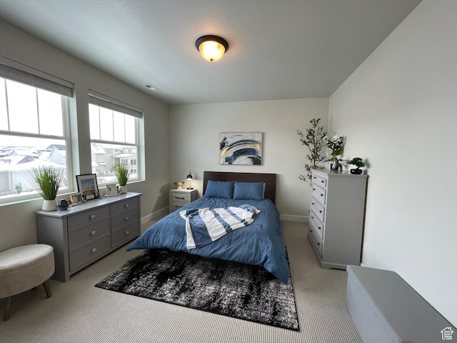 10887 S Lamond Dr, South Jordan, UT 84009 - bedroom with visible vents, light colored carpet, and baseboards