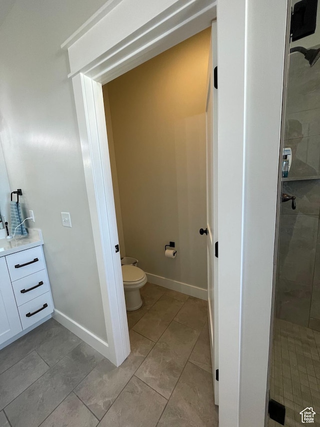 10887 S Lamond Dr, South Jordan, UT 84009 - full bath featuring a shower stall, toilet, and baseboards