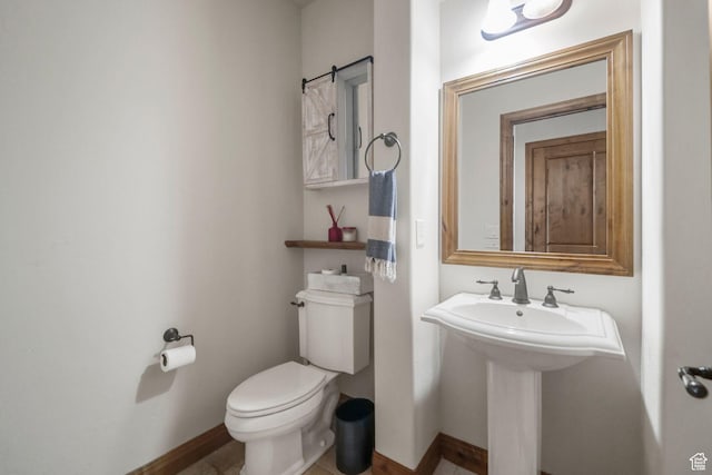 1056 W Lime Canyon Rd, Midway, UT 84049 - bathroom with baseboards, a sink, and toilet
