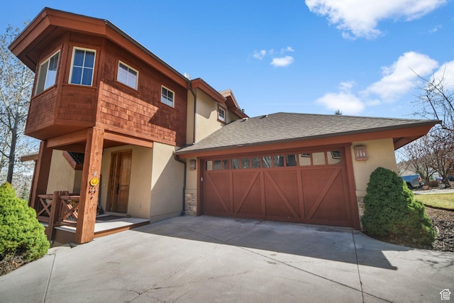 1056 W Lime Canyon Rd, Midway, UT 84049 - view of front of property with an attached garage, driveway, and stucco siding