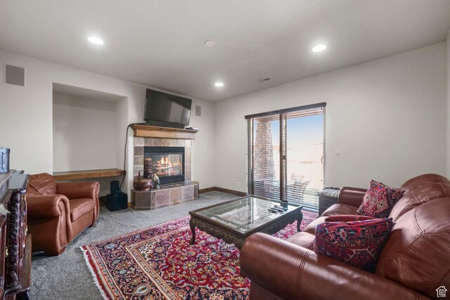 1056 W Lime Canyon Rd, Midway, UT 84049 - living room featuring a tile fireplace, carpet flooring, visible vents, and recessed lighting